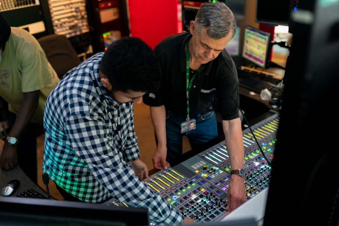 Diverse team of video production professionals collaborating in a studio